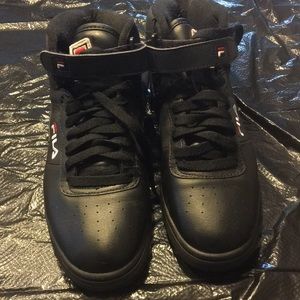 Black Fila high top sneakers